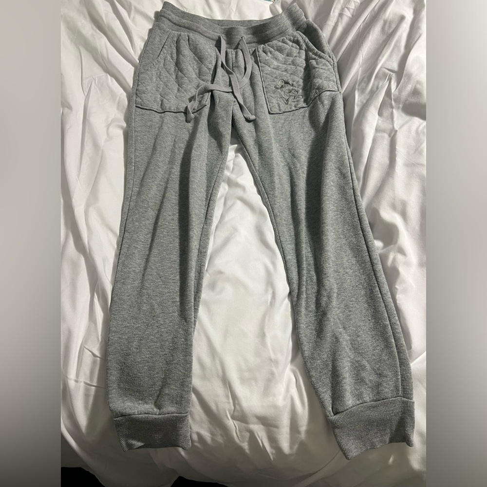 Pair of Disney sweatpants size medium